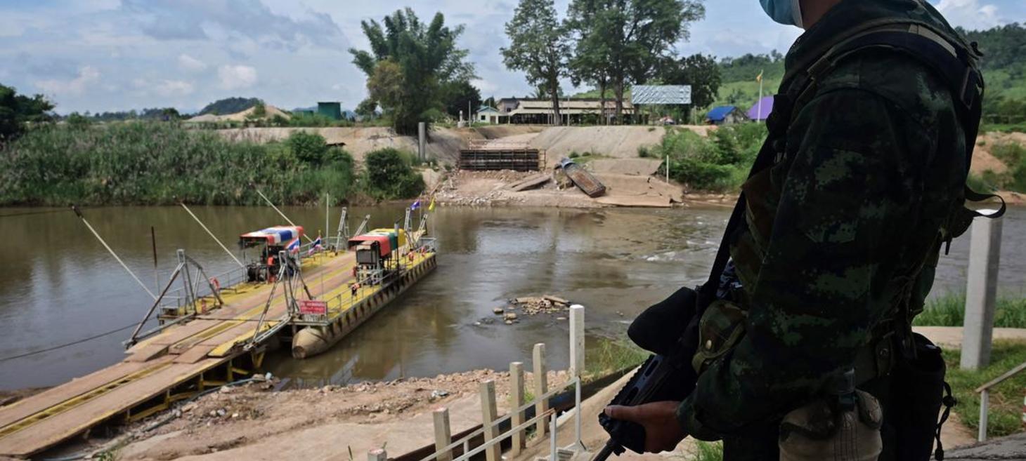 Hundreds of Myanmar troops and civilians flee across Thai border
