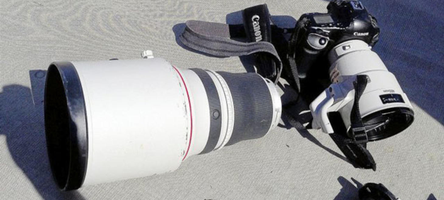 Football Player Falls On and Snaps Canon Telephoto Lens in Half on the Sideline