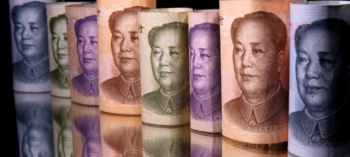 Exclusive: China's state banks told to stock up for yuan intervention
