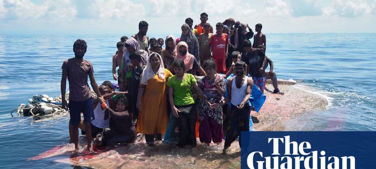 Dozens of Rohingya refugees rescued from overturned boat in Indian Ocean